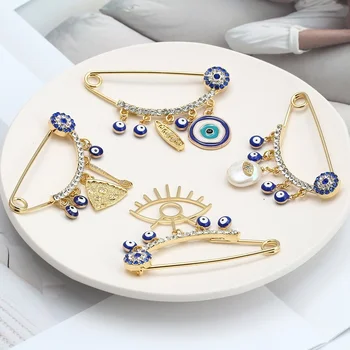 La nouvelle Mode de la Chance Œil Bleu turc Mauvais Œil Simple Palm Brooch Pin de Couleur d'Or en Alliage de Charme Broche pour Femmes Hommes Bijoux de Mode