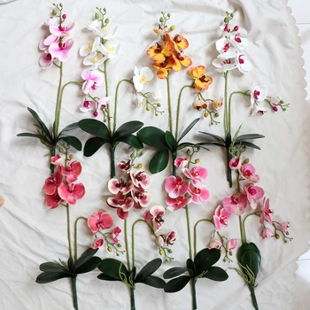 Livraison Gratuite Royal Blanc Soie Artificielle Orchidée Fleurs Avec Des Feuilles De Maison Mariage Jardin En Plein Air Accessoires De Décoration